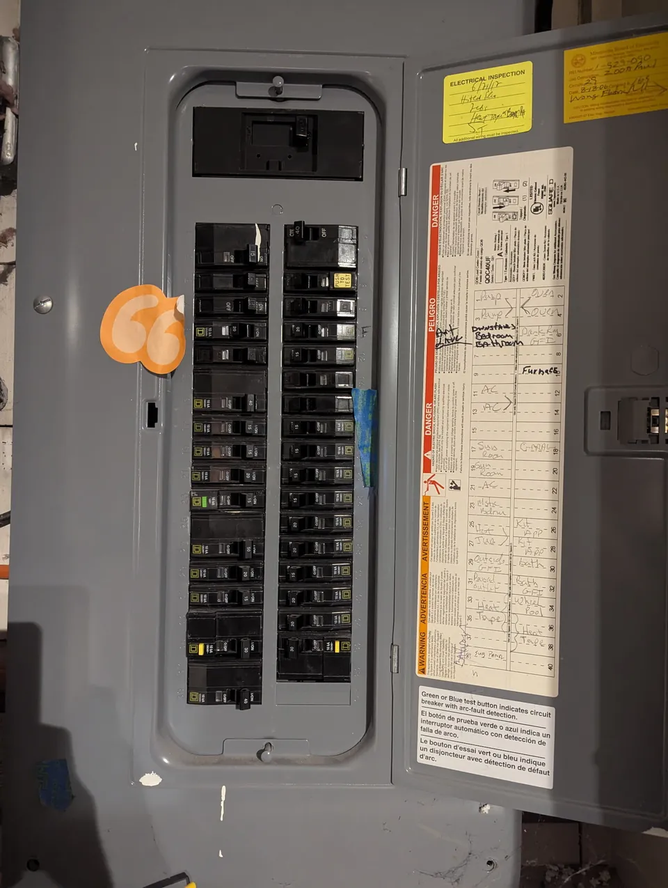 New 200 amp panel with the door open and a labeled circuit directory